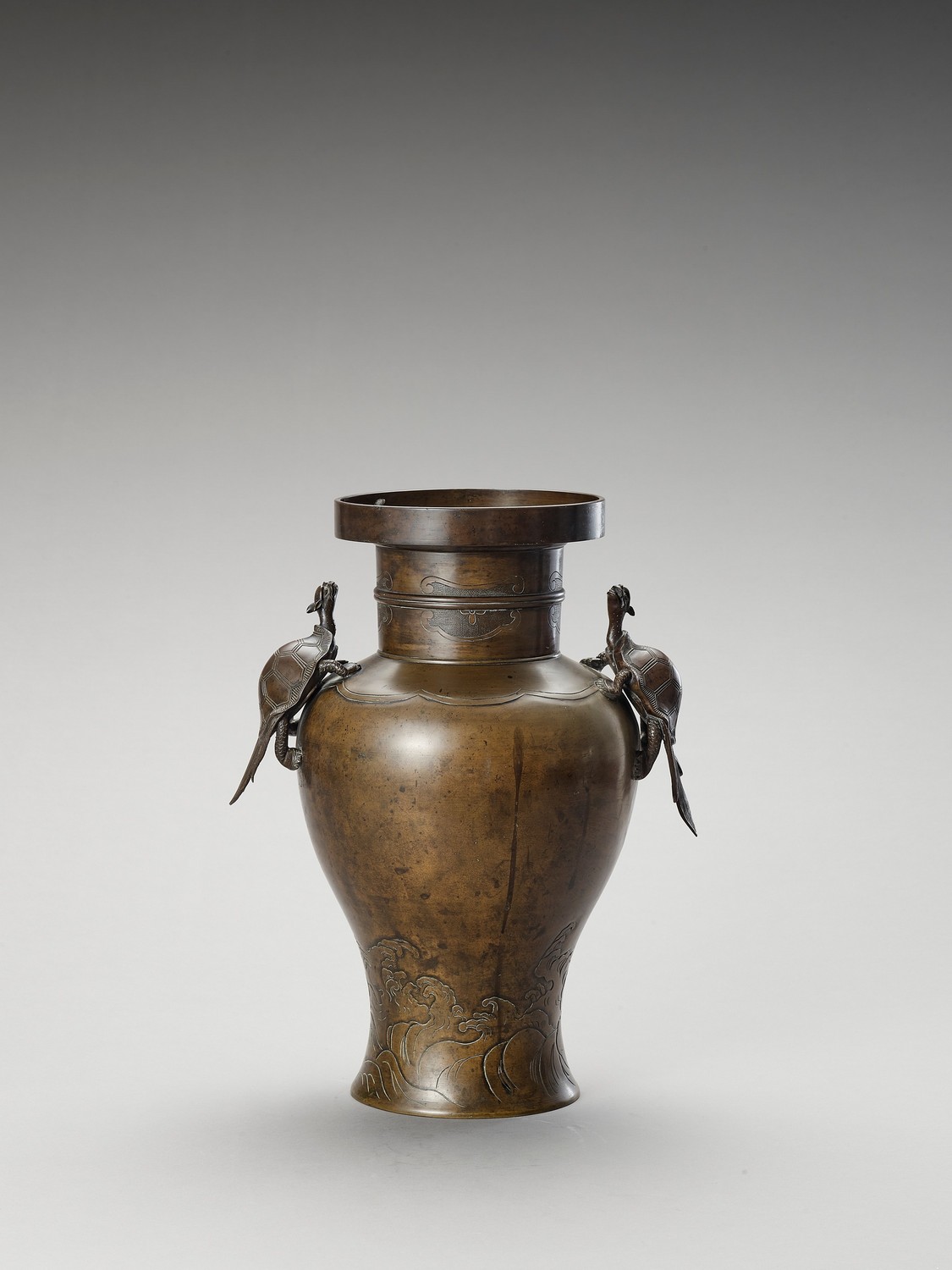 A BRONZE BALUSTER VASE WITH MINOGAME AND WAVES