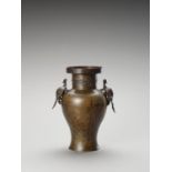 A BRONZE BALUSTER VASE WITH MINOGAME AND WAVES