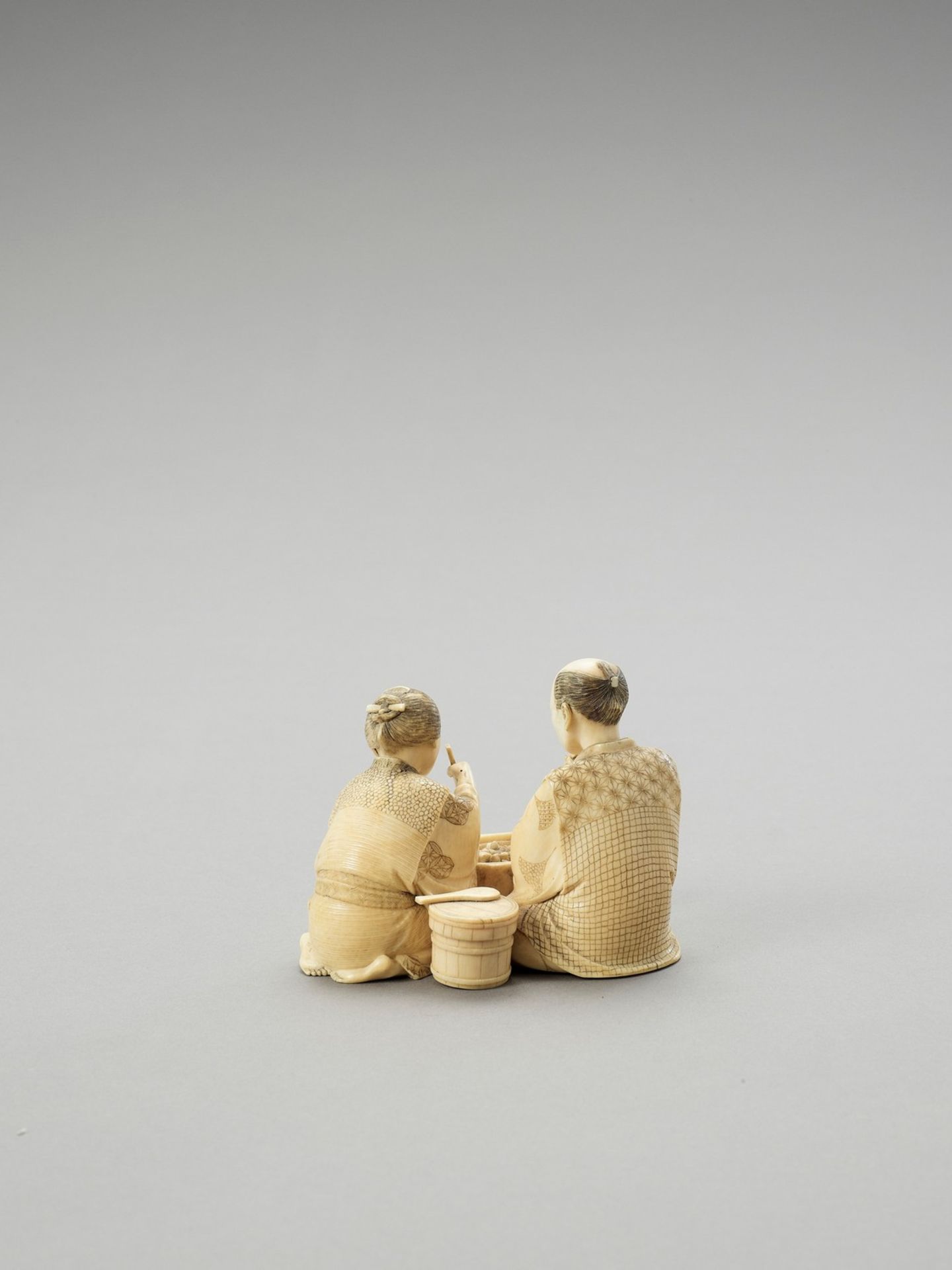 AN IVORY OKIMONO OF A COUPLE EATING - Image 4 of 5