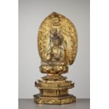 A LARGE AND COMPLETE GILT-LACQUERED WOOD STATUE OF KANNON BOSATSU