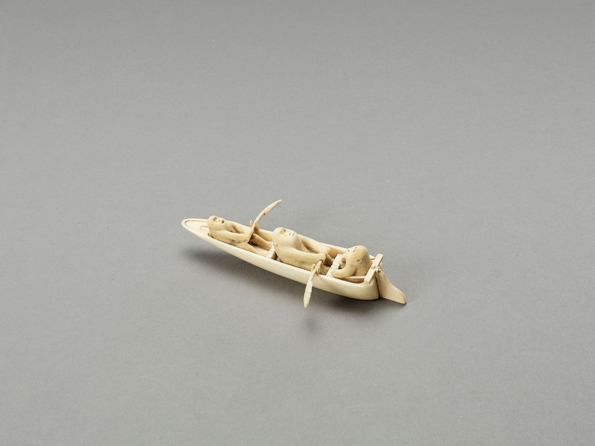 AN AMUSING IVORY OKIMONO OF MONKEYS IN A BOAT - Image 2 of 3