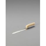 AN IVORY AND SILVER LETTER OPENER
