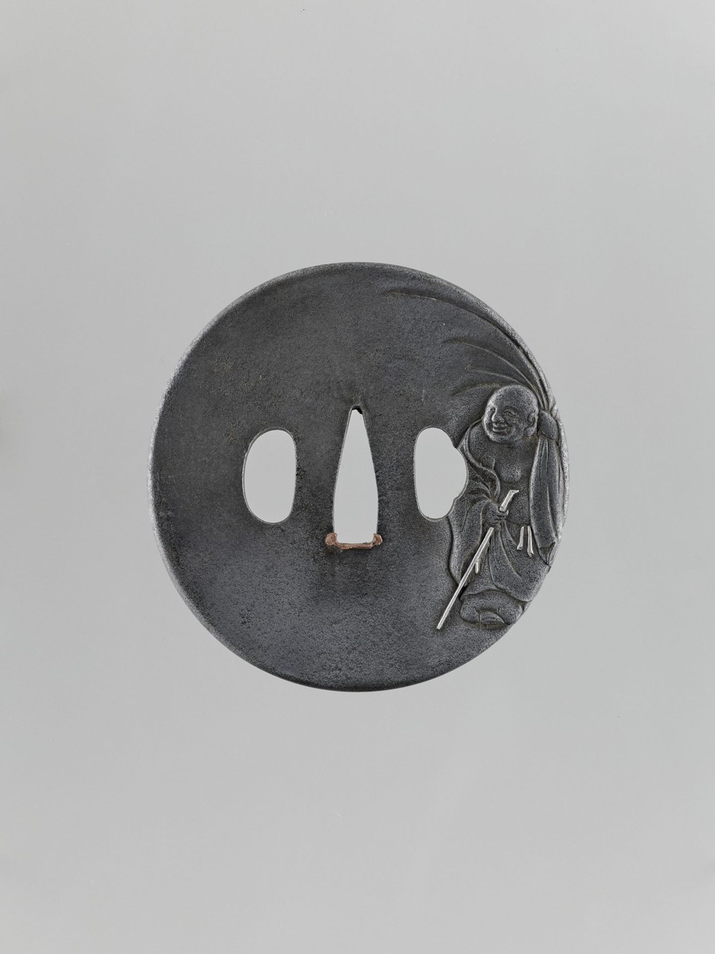 A SILVERED IRON TSUBA OF HOTEI