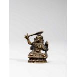 A TIBETAN MINIATURE BRONZE OF MANJUSHRI, 18TH-19TH CENTURY