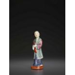 A MOLDED PORCELAIN COURT LADY, QING