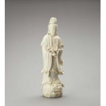 AN IMPRESSIVE AND VERY LARGE BLANC DE CHINE PORCELAIN FIGURE OF GUANYIN