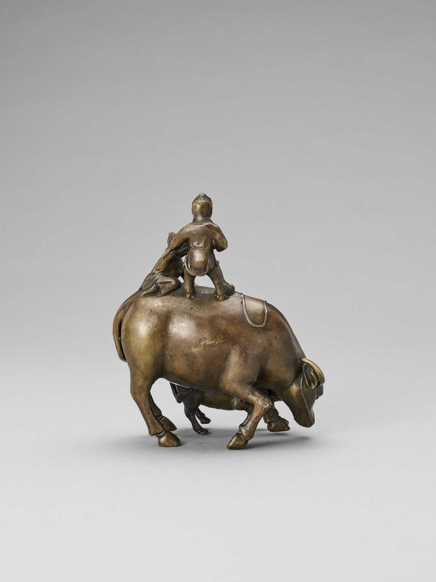 A BRONZE FIGURE OF BOYS ON BUFFALOS - Image 7 of 8