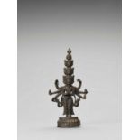 A SINO-TIBETAN BRONZE FIGURE OF EKADASHAMUKHA AVALOKITESVARA, QING