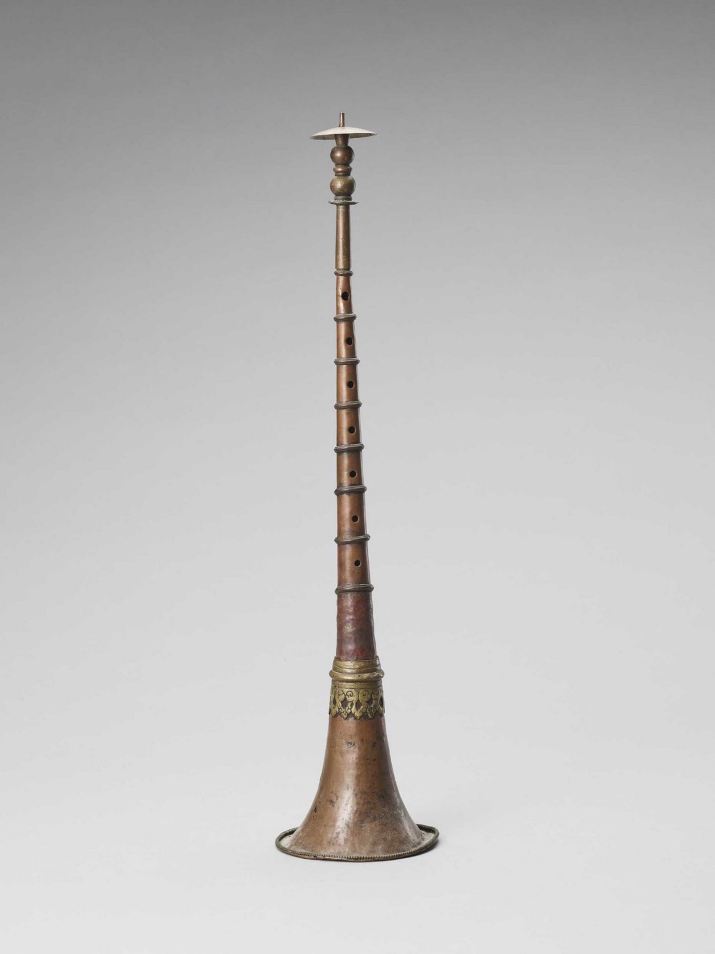 A RARE TIBETAN BRONZE ALLOY CEREMONIAL HORN, 19TH CENTURY