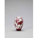 A RUBY RED OVERLAY PEKING GLASS ‘LOTUS’ VASE, QING