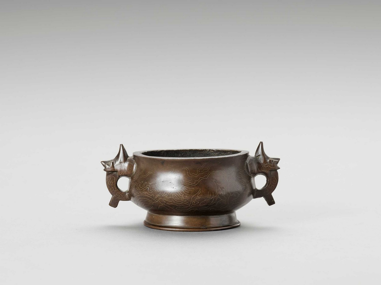 A GILT WIRE-INLAID BRONZE BOMBÉ CENSER, 17TH CENTURY