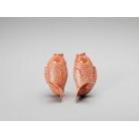 A PAIR OF GLAZED ‘CARP’ PORCELAIN WALL-VASES