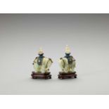 A PAIR OF CAPARISONED JADE ELEPHANTS