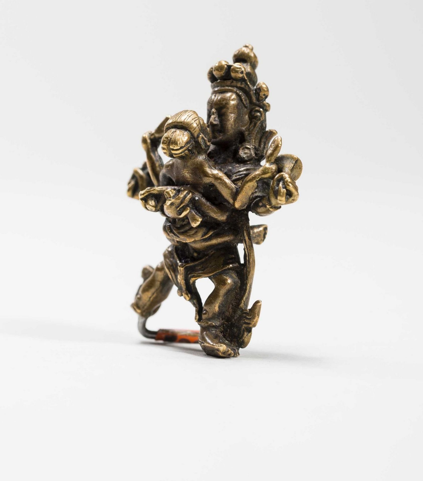 A TIBETAN BRONZE OF A DHARMAPALA IN YABYUM WITH PRAJNA, 18TH-19TH CENTURY - Image 2 of 7