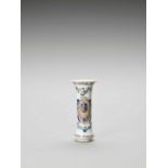 A CHINESE STYLE PORCELAIN BEAKER VASE