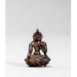 A TIBETAN MINIATURE BRONZE OF AKSHOBHYA, 18TH-19TH CENTURY