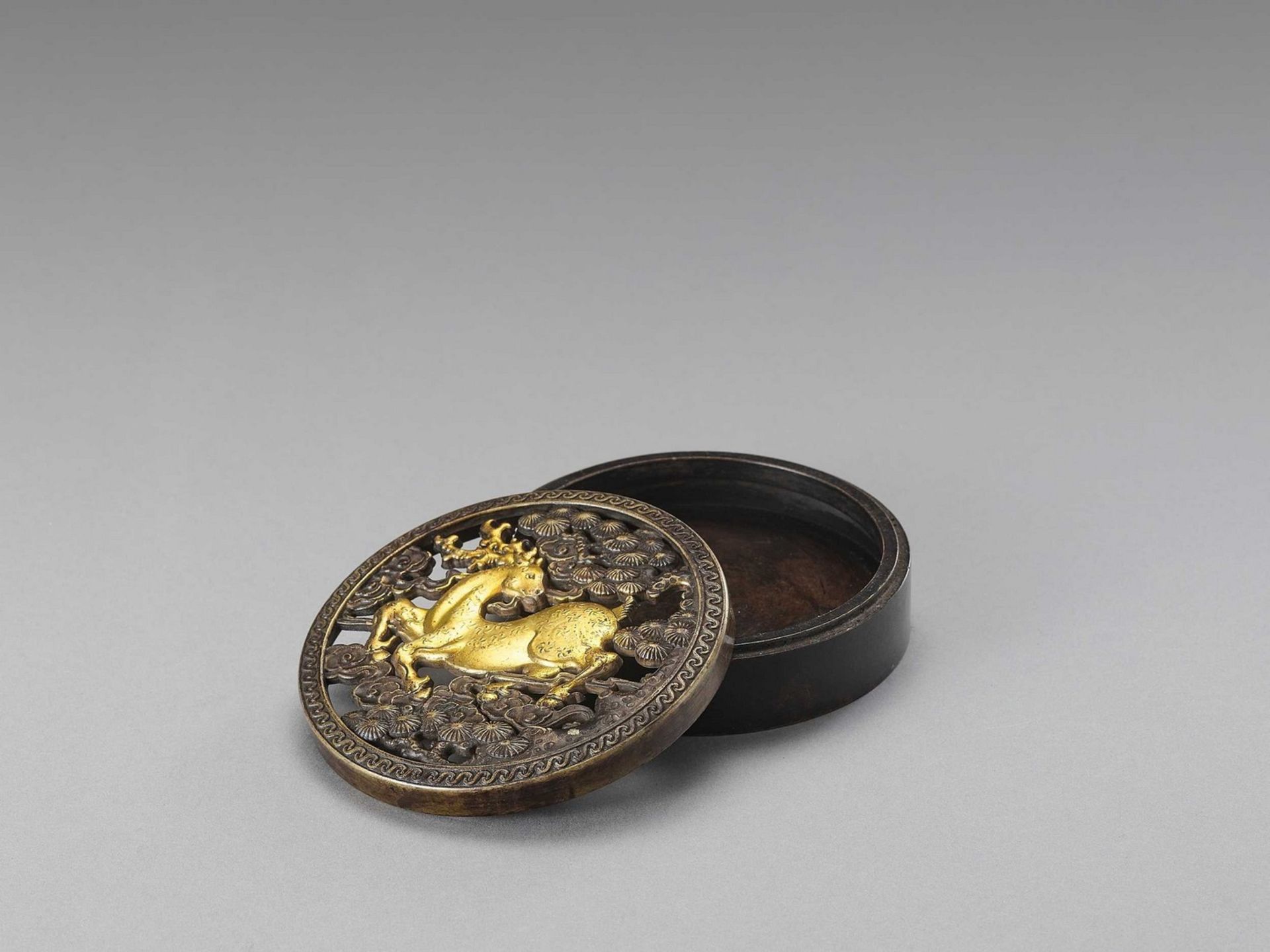 A PARCEL GILT ‘STAG AND PINE’ INCENSE BOX, LATE QING TO REPUBLIC