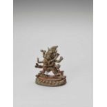 A HEAVY SINO-TIBETAN BRONZE FIGURE OF MAHAKALA AND CONSORT, QING