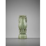 A CARVED LONGQUAN WALL VASE, MING