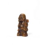 A TIGER’S EYE MINIATURE CARVING OF BUDAI, QING OR REPUBLIC