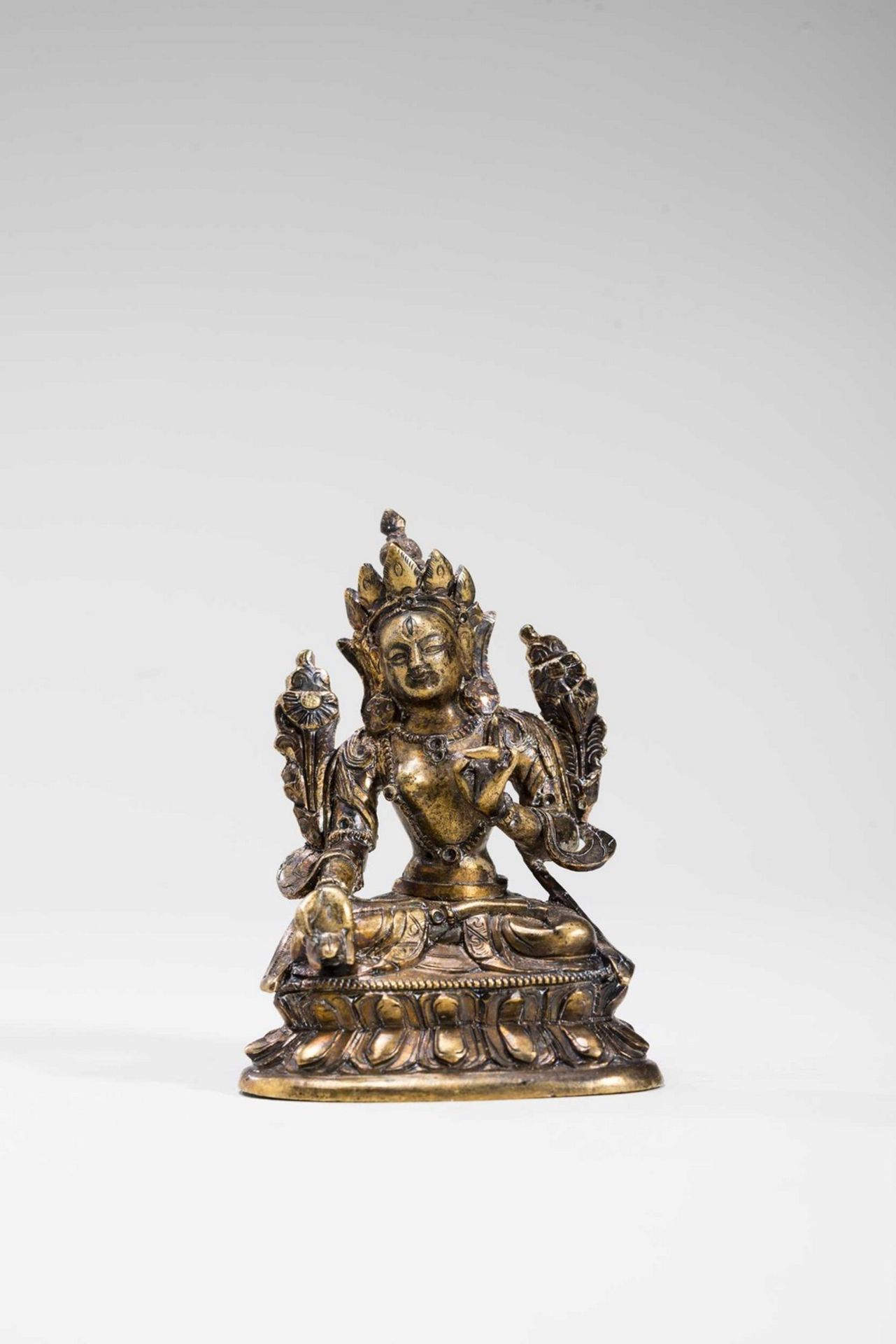 A SINO-TIBETAN GILT MINIATURE BRONZE OF SITATARA, 18TH CENTURY