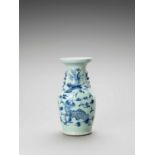 A BLUE AND WHITE CELADON-GLAZED ‘QILIN AND PHOENIX’ VASE, LATE QING