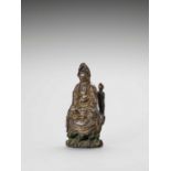 A GILT-LACQUERED WOOD FIGURE OF GUANYIN, 17th CENTURY