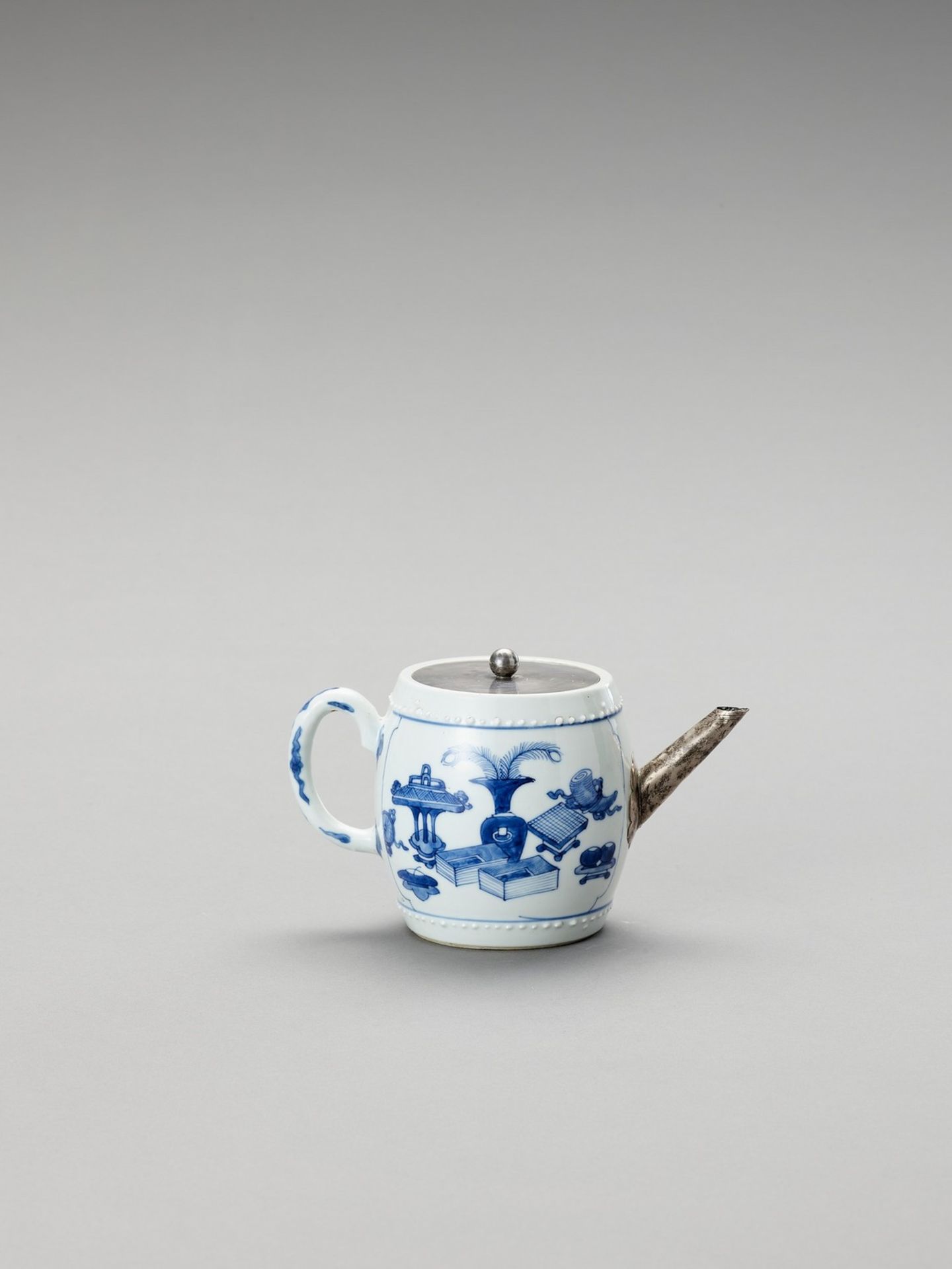 A SILVER-MOUNTED BLUE AND WHITE PORCELAIN TEAPOT