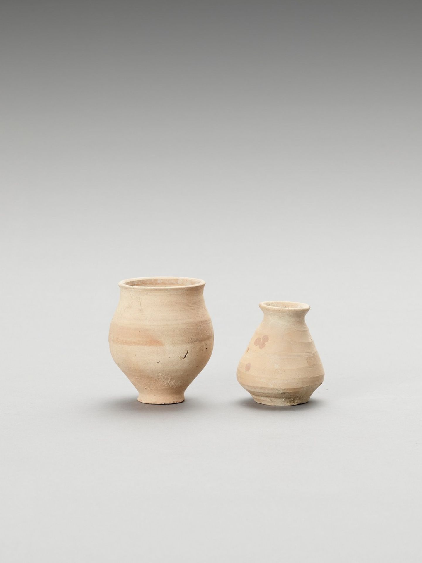 TWO EARLY MEHRGARH SMALL CERAMIC VESSELS