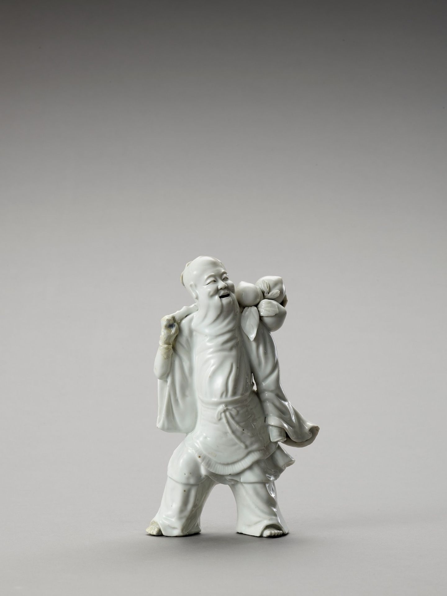 A BLANC DE CHINE FIGURE OF SHOULAO