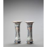 A LARGE PAIR OF IMARI PORCELAIN BEAKER VASES