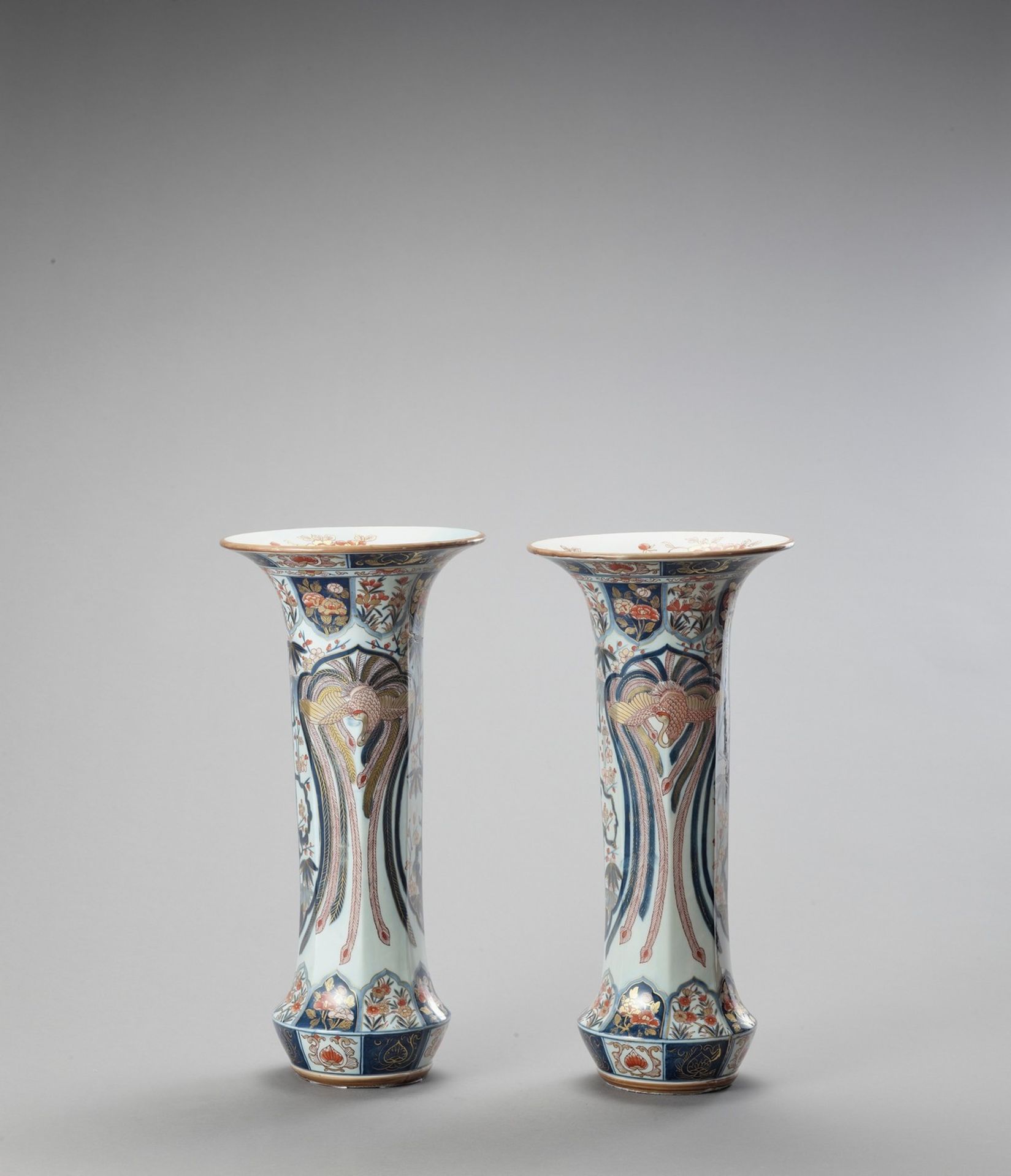 A LARGE PAIR OF IMARI PORCELAIN BEAKER VASES