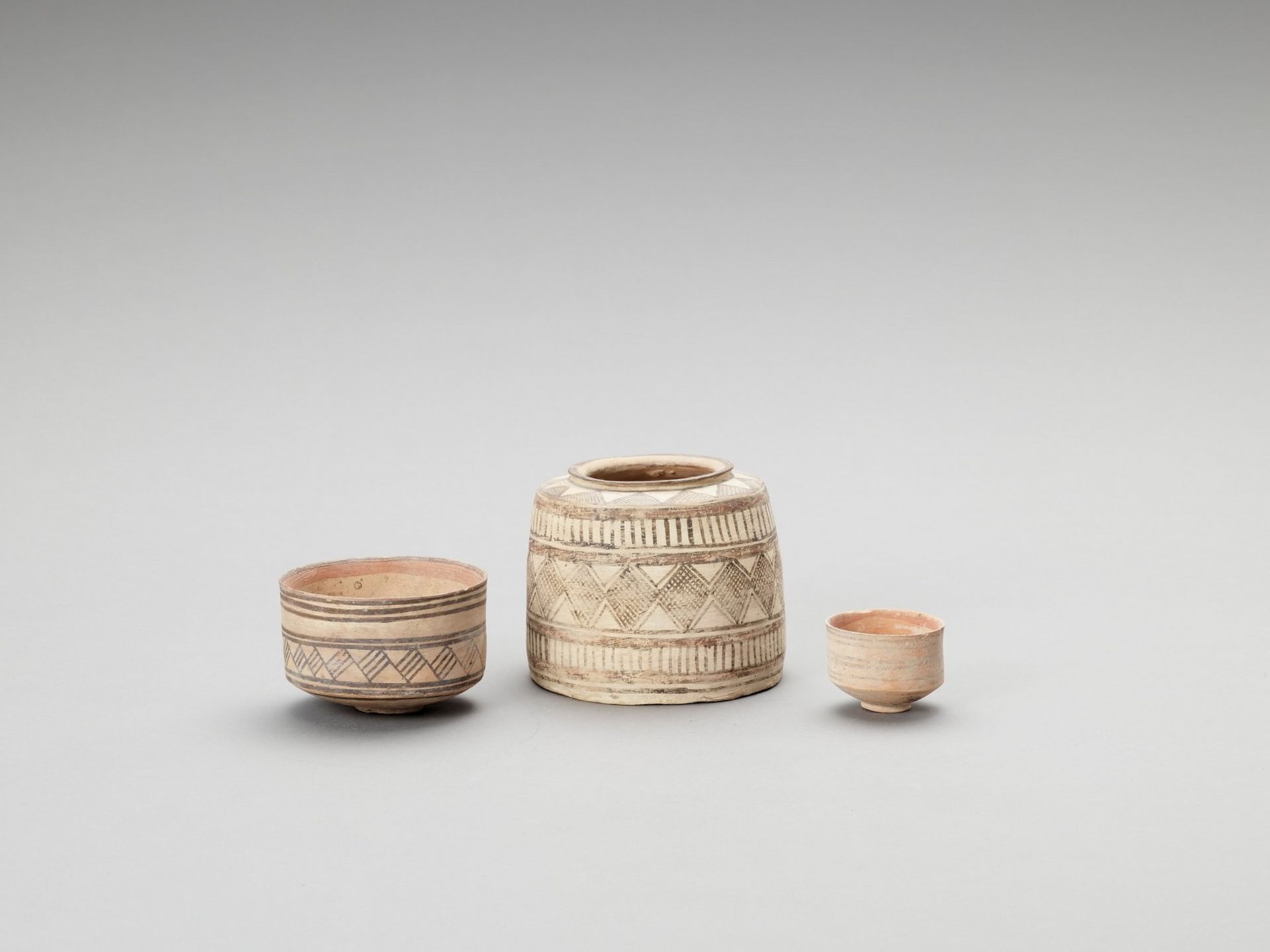 THREE CLASSICAL CERAMIC MEHRGARH VESSELS