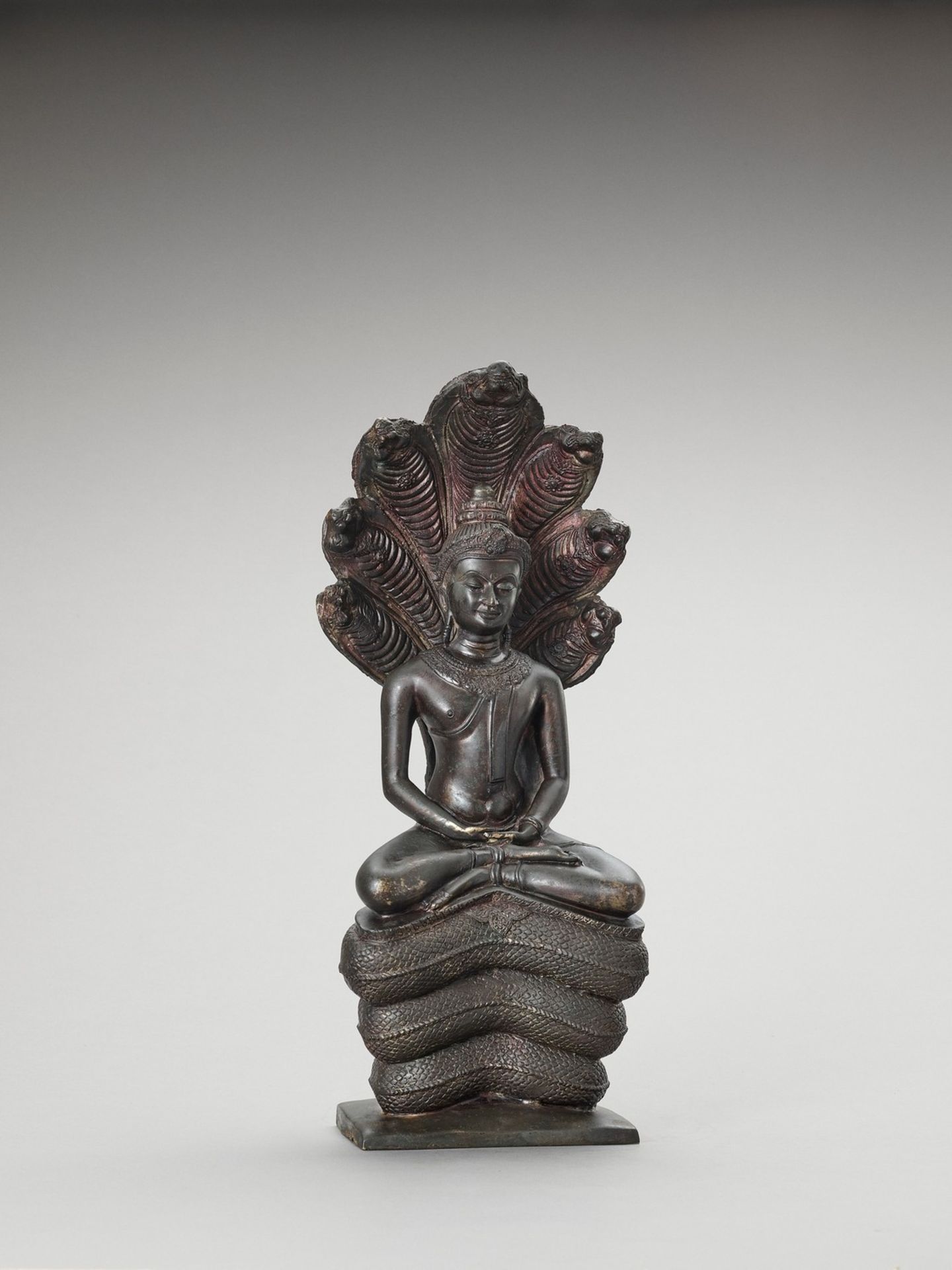 A KHMER STYLE BRONZE OF BUDDHA MUCHALINDA - Image 6 of 7