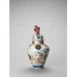 A LARGE IMARI PORCELAIN BALUSTER VASE AND COVER