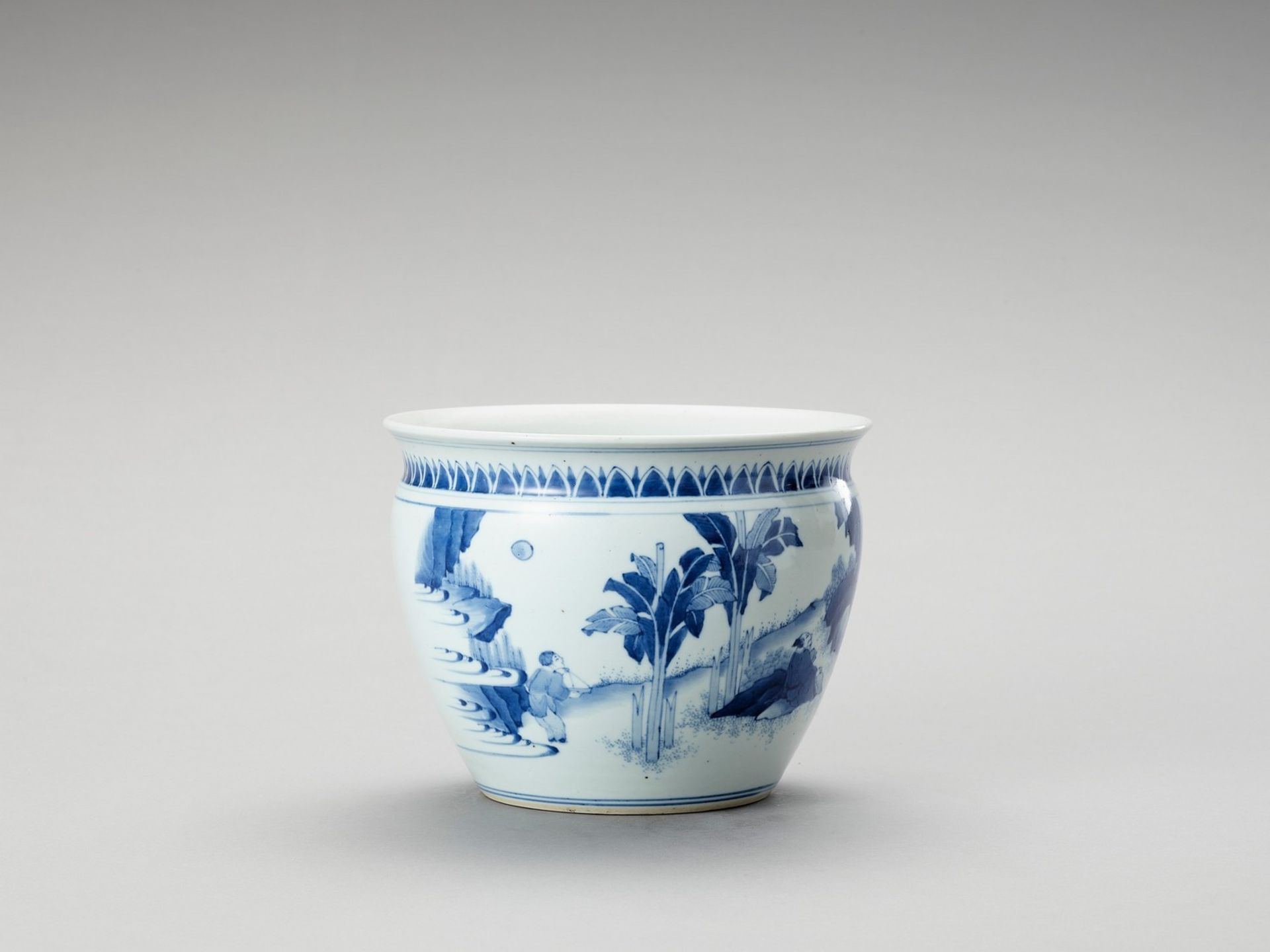 A FIGURATIVE BLUE AND WHITE PORCELAIN JARDINIERE - Image 4 of 7