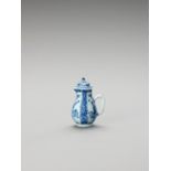 A SMALL BLUE AND WHITE PORCELAIN JUG AND COVER