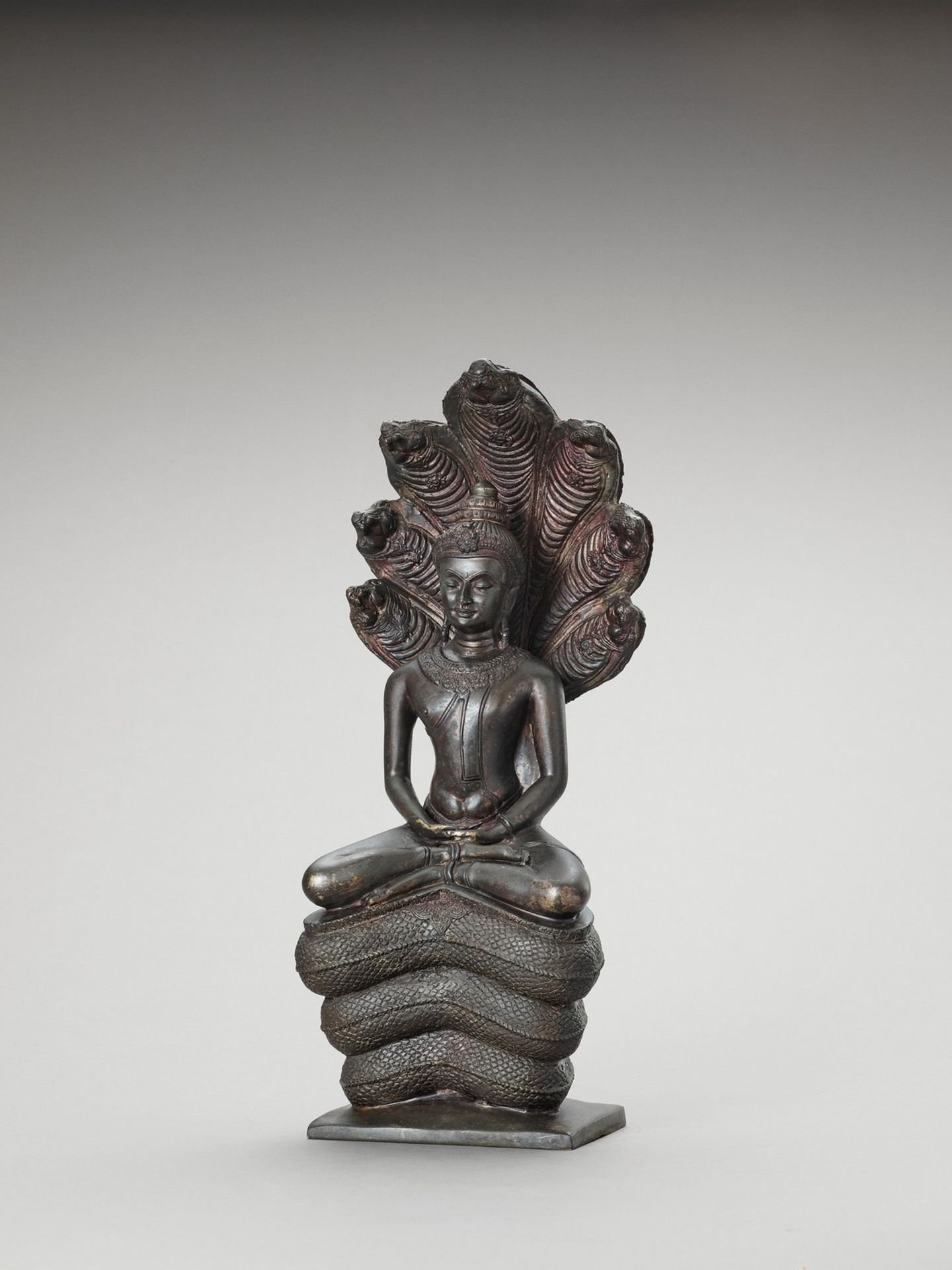 A KHMER STYLE BRONZE OF BUDDHA MUCHALINDA - Image 3 of 7