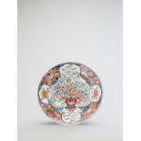 A LARGE IMARI PORCELAIN CHARGER