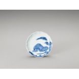 A BLUE AND WHITE LOBED PORCELAIN DISH WITH TIGER