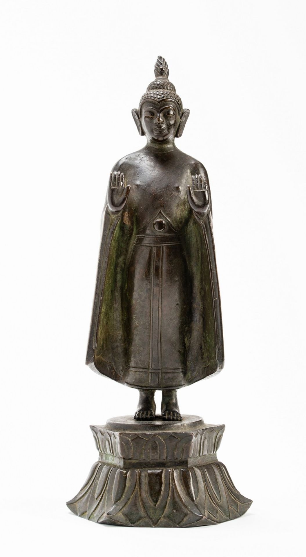 A BRONZE FIGURE OF A STANDING BUDDHA