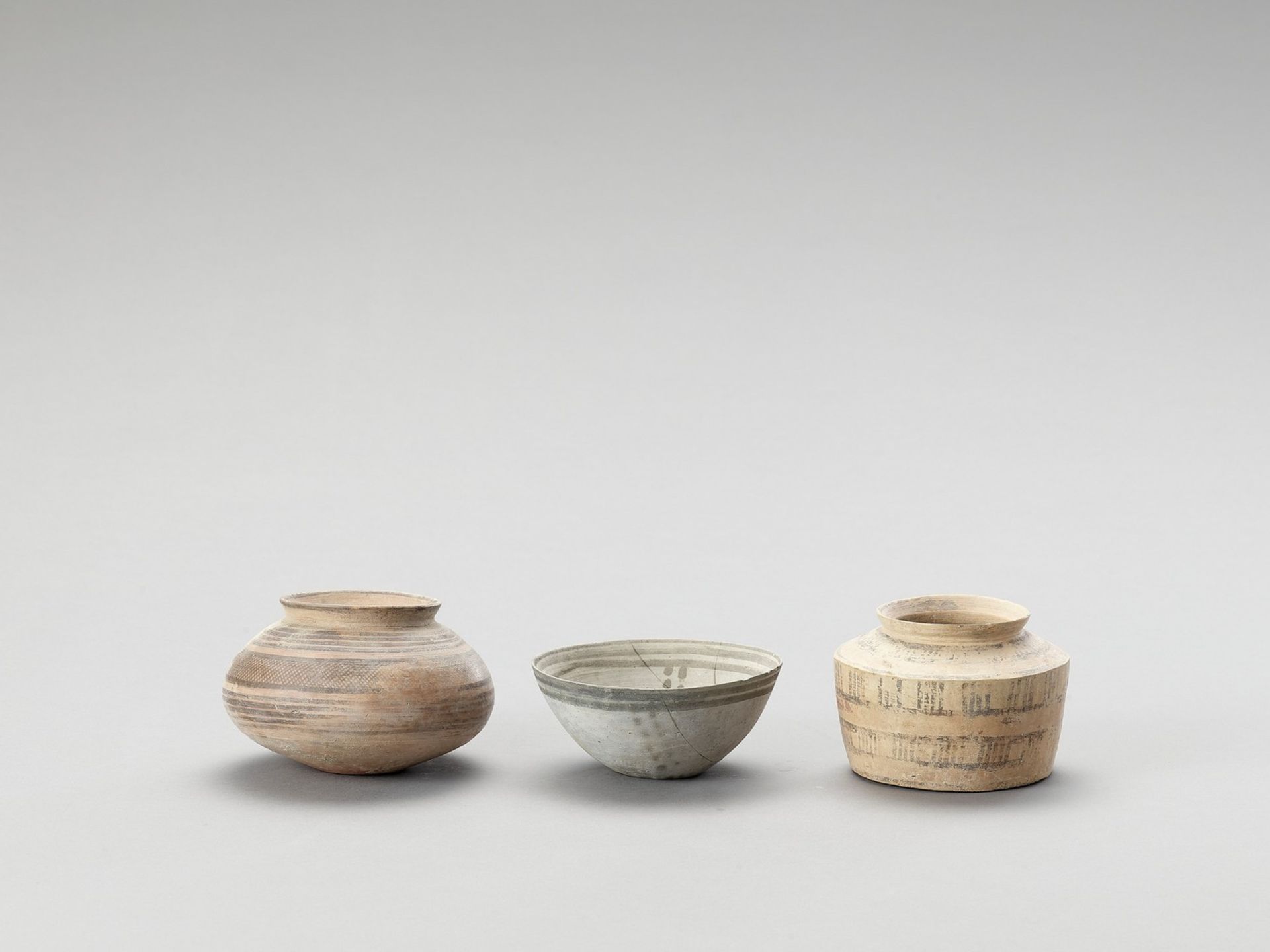 THREE MEHRGARH CERAMIC VESSELS