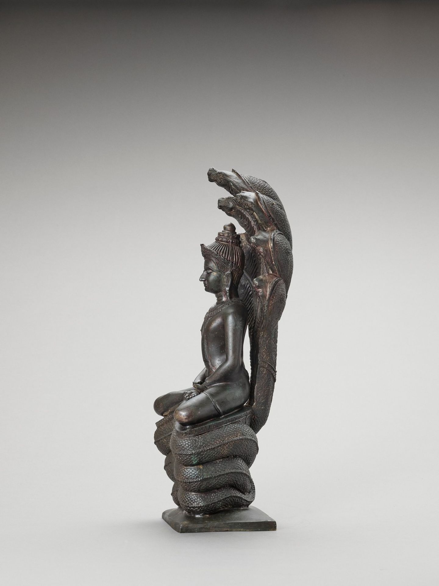 A KHMER STYLE BRONZE OF BUDDHA MUCHALINDA - Image 4 of 7