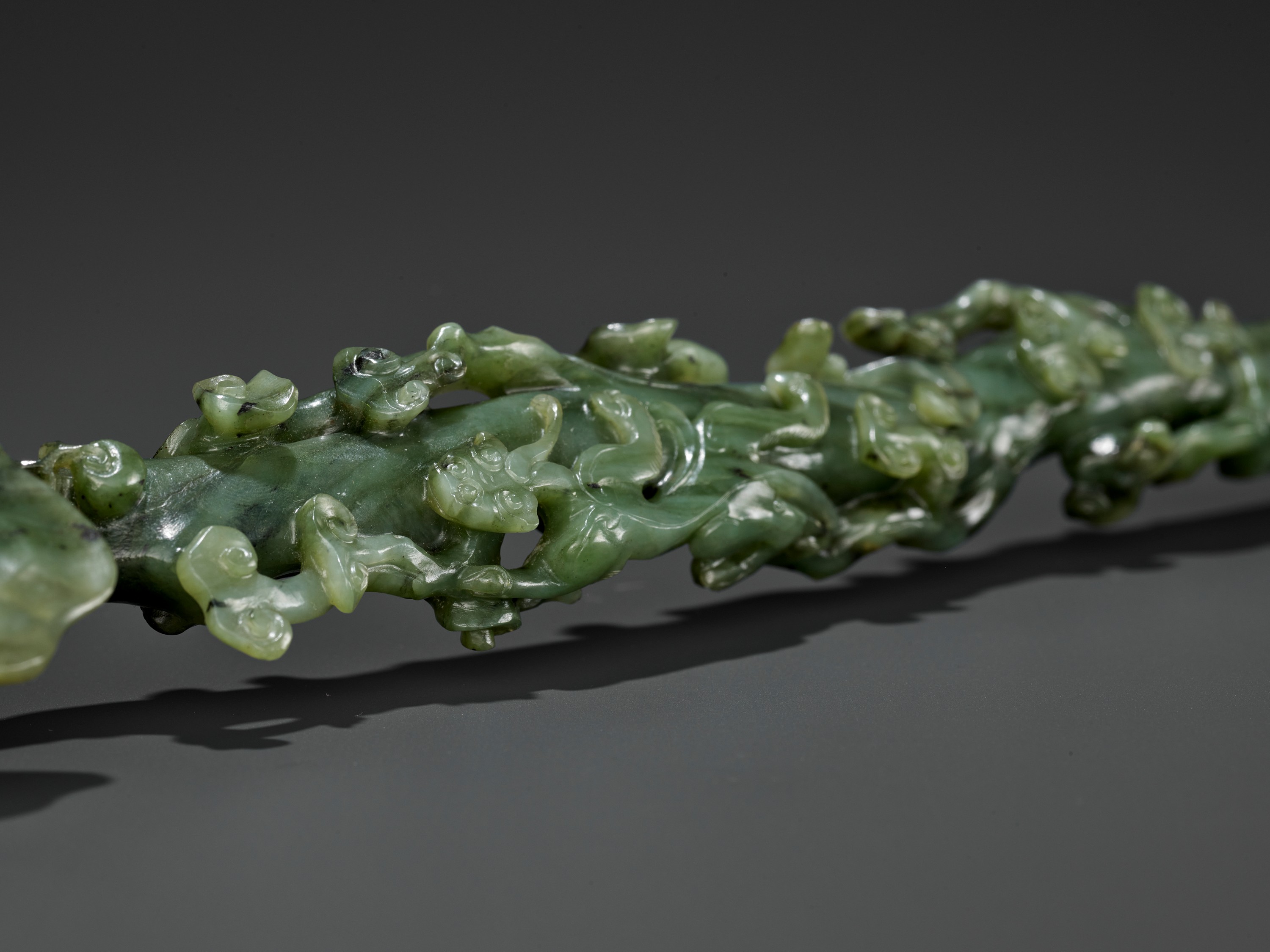 A SPINACH-GREEN JADE RUYI SCEPTER, MID-QING - Image 9 of 15