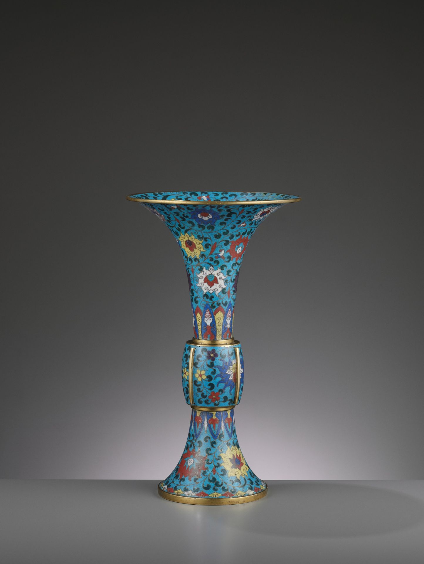 A LARGE CLOISONNE AND GILT-BRONZE GU, QING DYNASTY