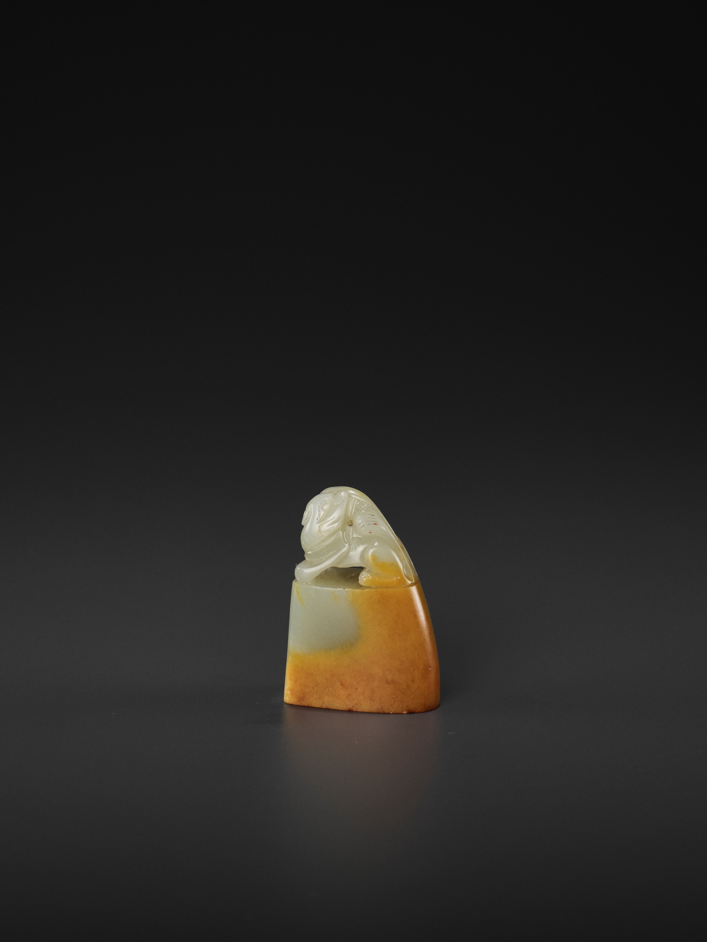 A PALE CELADON AND AMBER JADE 'BUDDHIST LION' SEAL, MID-QING TO REPUBLIC - Image 3 of 5