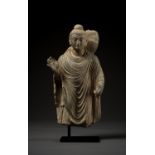 A GRAY SCHIST FIGURE OF BUDDHA, GANDHARA, 2ND-3RD CENTURY