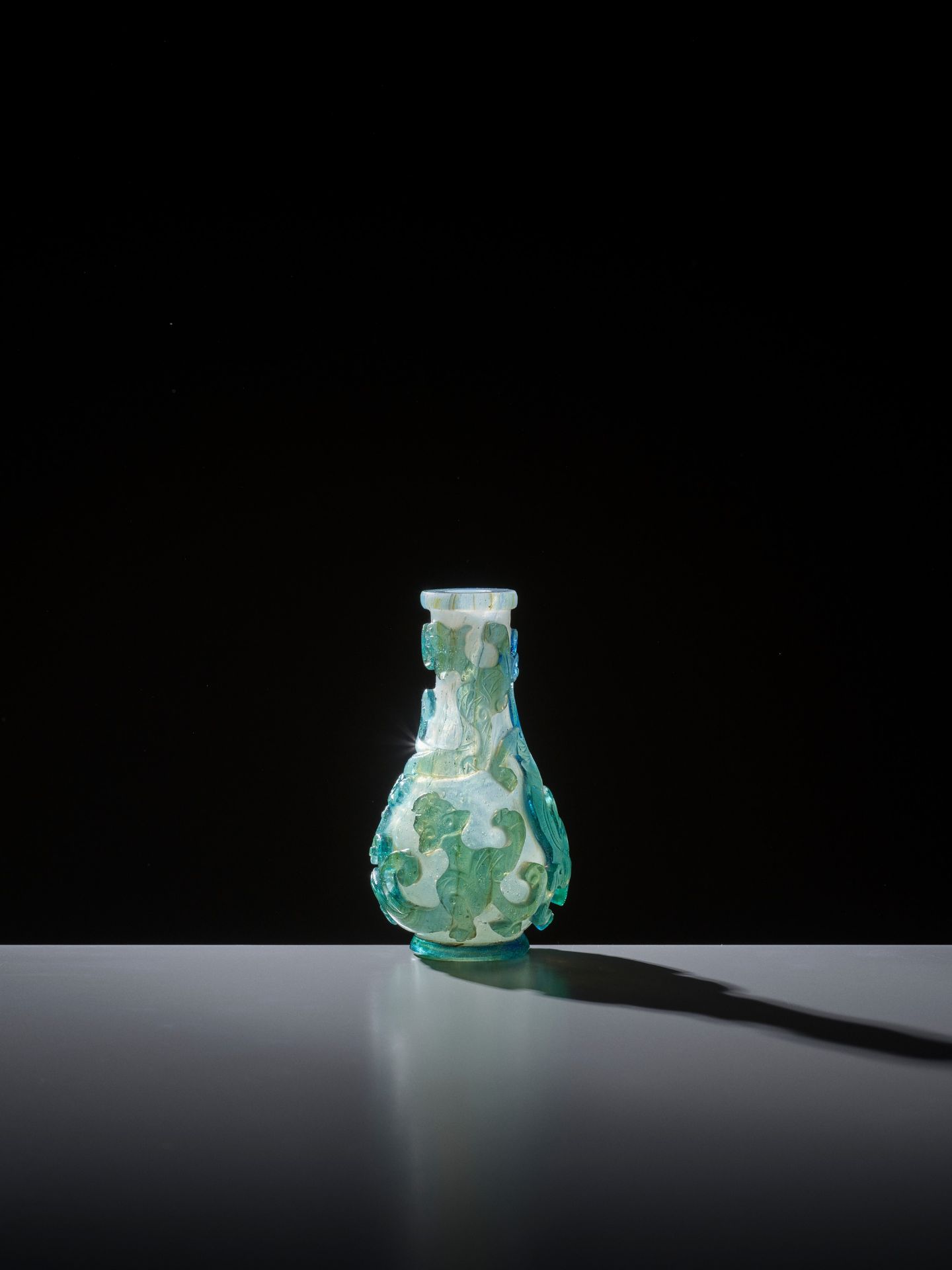 AN AQUAMARINE OVERLAY 'CHILONG' MINIATURE VASE, YUHUCHUNPING, QING