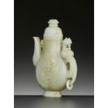 A PALE CELADON JADE 'PHOENIX' EWER AND COVER, QING DYNASTY