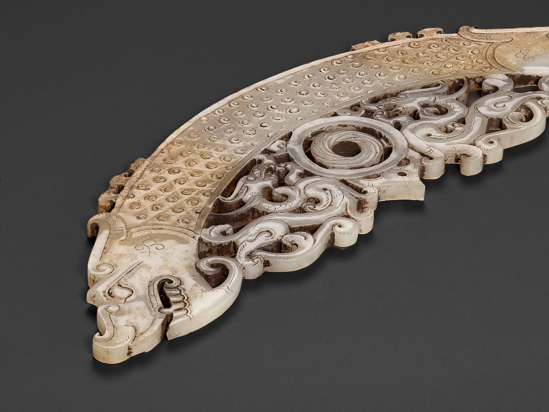 A WHITE AND RUSSET JADE 'DOUBLE DRAGON' PENDANT, HUANG, LATE EASTERN ZHOU TO HAN - Image 3 of 9